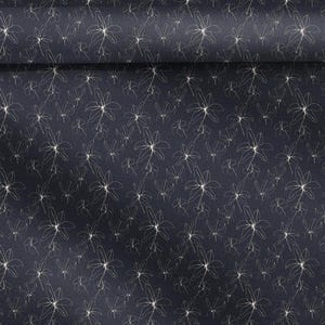 May include: Dark navy fabric with a repeating pattern of stylized, cream-colored floral outlines. The design features multiple sizes of the floral motif, creating a textured appearance. The fabric is folded, showing the pattern's continuity.