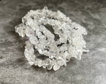 Perles de cristal 5 x 8 mm sur chaîne