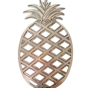 Metalowa podstawka pod ananas w kolorze srebra