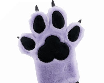 May include: A purple plush paw with black claws and a black paw pad. The paw is designed to look like a cat paw.