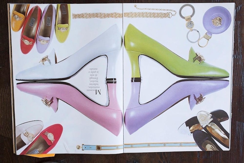 May include: A magazine spread showcasing women's footwear and accessories. The image features high-heeled shoes in white, pink, and green, alongside loafers in various colours. Accessories include a gold chain and a keychain.