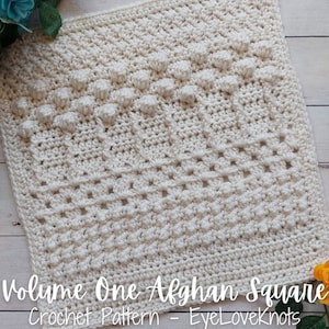 Puede incluir: Un patrón de crochet para una manta cuadrada blanca, titulada "Volume One Afghan Square" con el texto "Crochet Pattern - EyeLoveKnots" debajo.