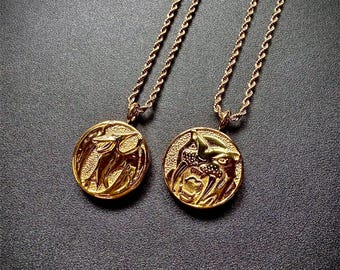 Gold Pterodactyl & Saber-Tooth Tiger Power Coin Necklace
