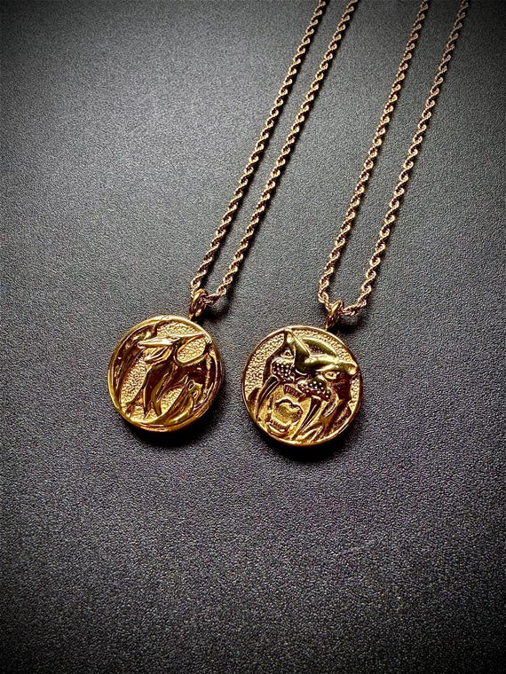 Gold Pterodactyl & Saber-tooth Tiger Power Coin Necklace - Etsy