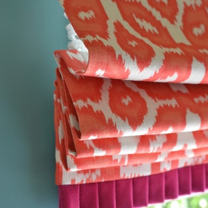 Custom roman shade with optional pleating on bottom edge