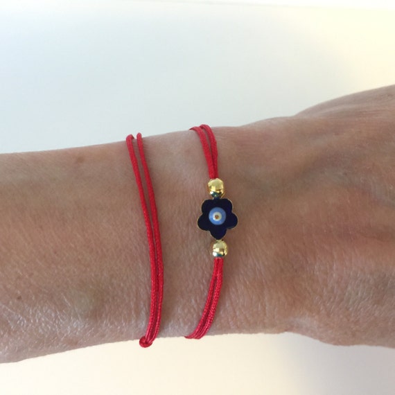 Red amulet hotsell bracelet