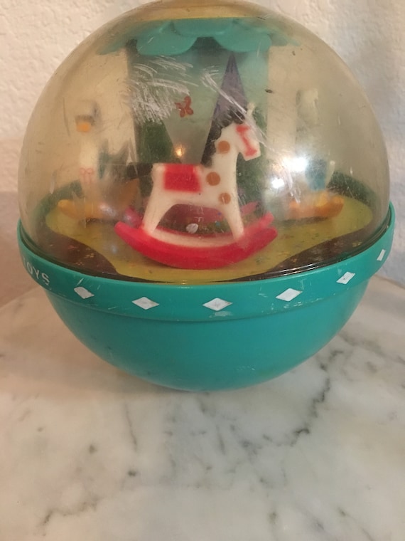 vintage fisher price roly poly chime ball