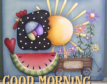 May include: A painted wooden sign with a chalkboard that says "Good Morning" and a black and white polka dot bow. The sign features a black and white polka dot chicken pulling a wagon with a watermelon and flowers. The text "Good Morning Sunshine" is written below the sign. The text "Painting with DEB" is written below the image.