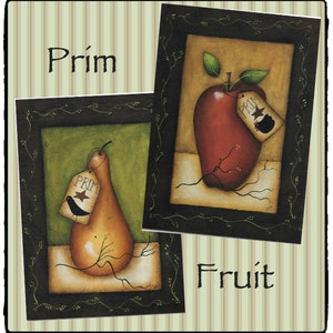 May include: Two framed paintings of fruit in a rustic, primitive style. The paintings feature a red apple and a pear with a brown twig and green leaves. Each painting has a small tag with the word "Prim" on it.