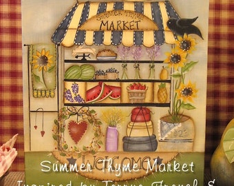 May include: A painted wooden sign depicting a summer market with a red, white, and blue striped awning. The sign says "Summer Thyme Market" and features a variety of fruits, vegetables, and other goods. The sign is painted in a folk art style and has a whimsical feel.