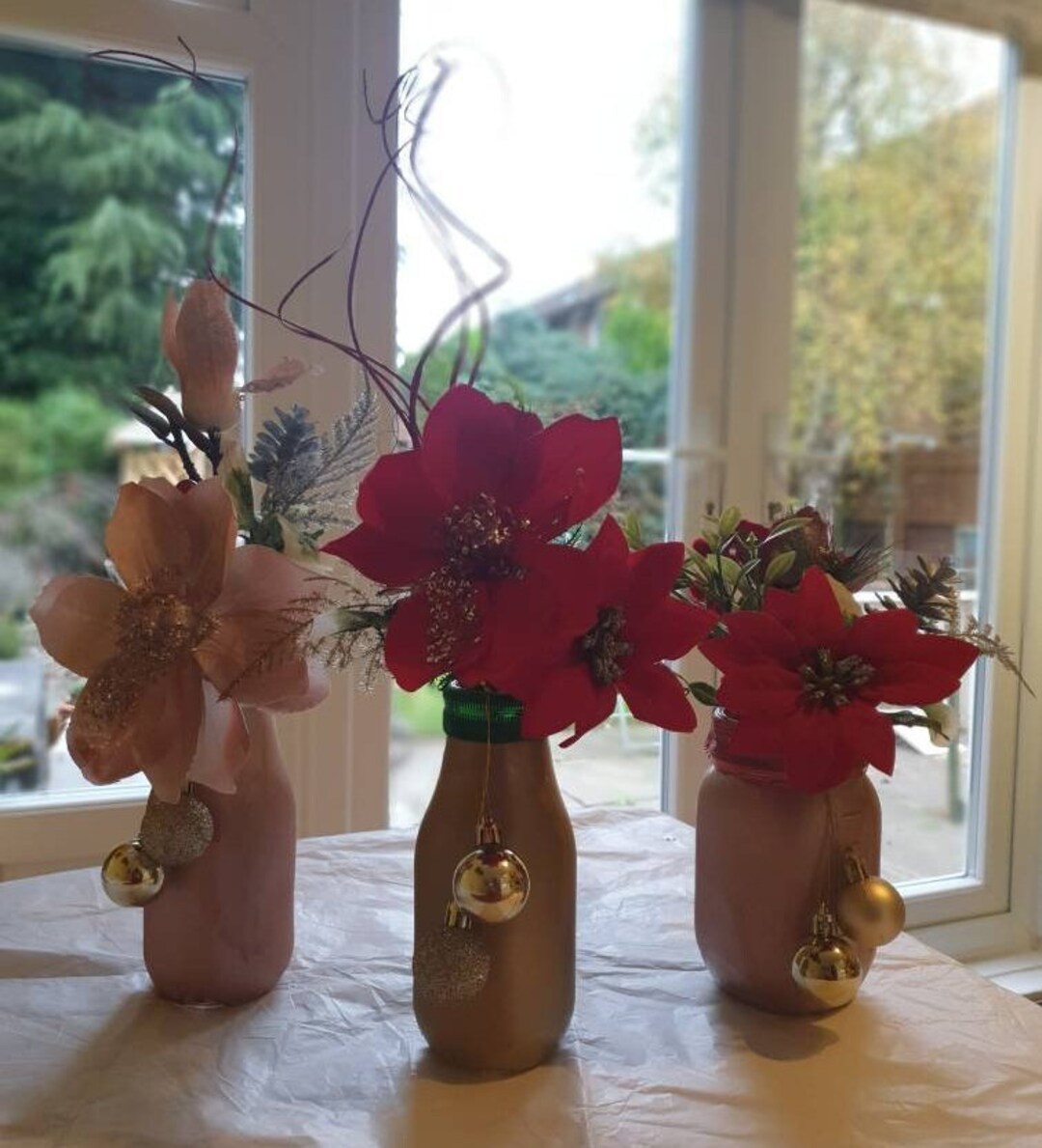 Artificial Christmas Flower Arrangements in Painted Glass Vase. OFFER