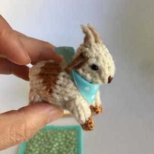 Hand knitted little goat.