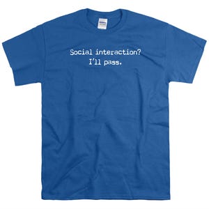May include: A royal blue t-shirt with the text "Social interaction? I'll pass." printed in white.