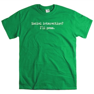 May include: A green t-shirt with the text "Social interaction? I'll pass." printed in white.