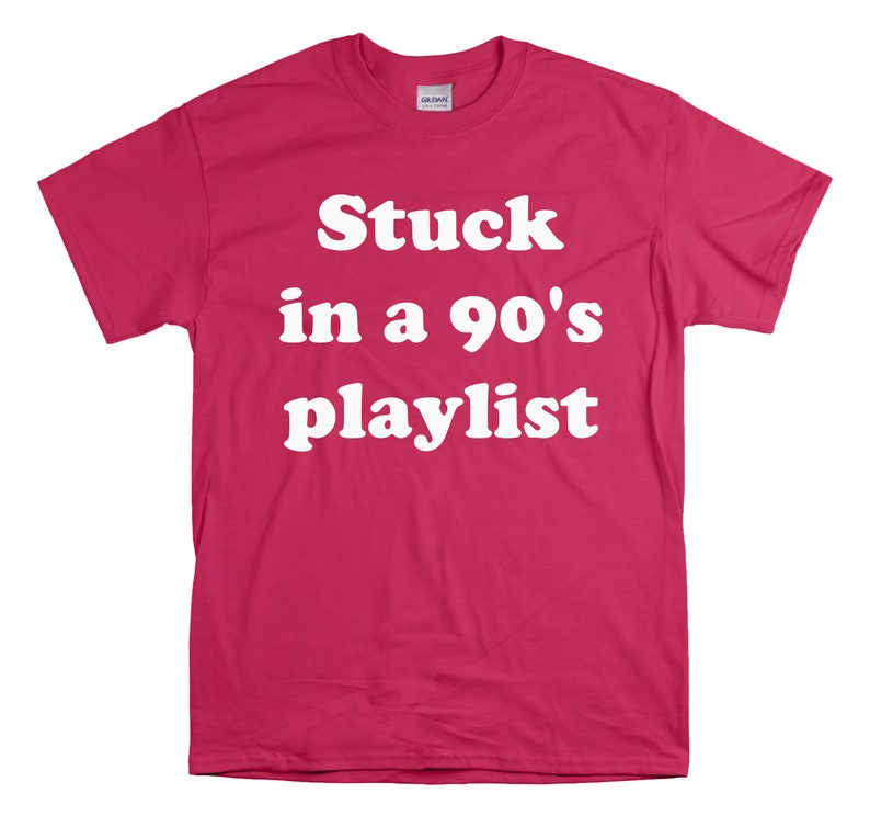 May include: A pink t-shirt with the text "Stuck in a 90's playlist" in white.