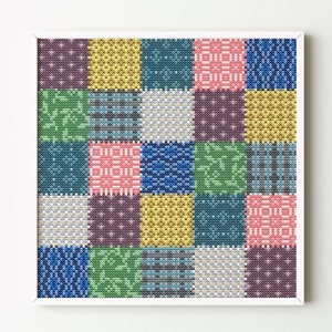 May include: A framed cross-stitch pattern with a patchwork design. The pattern features a variety of colors and textures, including blue, green, yellow, pink, and purple.