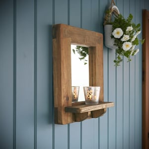 wooden wall mirror with shelf, sustainable natural wood, thick & chunky dark wood candle shelf, modern rustic custom handmade in Somerset UK