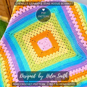 May include: A colorful, handmade crochet blanket with a granny square design. The blanket features a vibrant palette of pink, orange, yellow, green, blue, and purple. Text on the blanket reads "CHENILLE GRANNY'S GONE ROGUE BLANKET" and "Designed by Helen Smith".