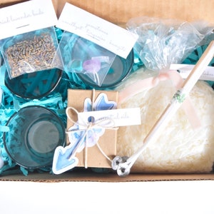 see the craft supplies inside the candle making kit for adults