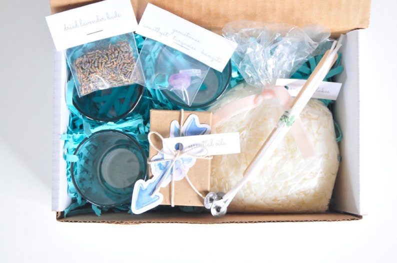 see the craft supplies inside the candle making kit for adults