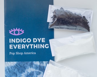 May include: Indigo dye kit with a blue booklet that says "Indigo Dye Everything Pop Shop America" and three white packets containing dye ingredients.