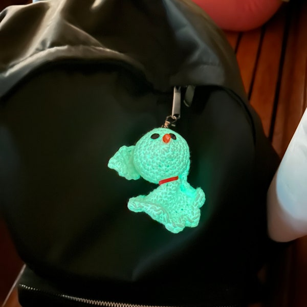 Glow in the dark ghost dog keychain