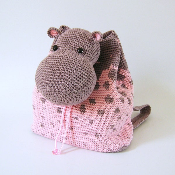 Crochet pattern for hippo backpack. Cute and practical accessory for kids. Charts with symbols, written instructions, photo tutorial.