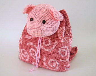 Crochet pattern for pig backpack. Cute and practical accessory for kids. Charts with symbols, written instructions, photo tutorial.