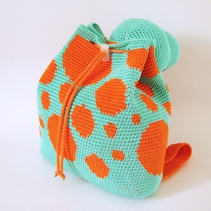 Crochet pattern for dino backpack. Cute and practical accessory for kids. Charts with symbols, written instructions, photo tutorial. image 2