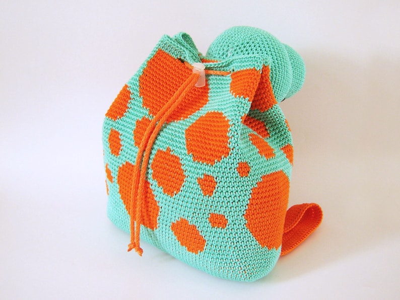 Crochet pattern for dino backpack. Cute and practical accessory for kids. Charts with symbols, written instructions, photo tutorial. image 2