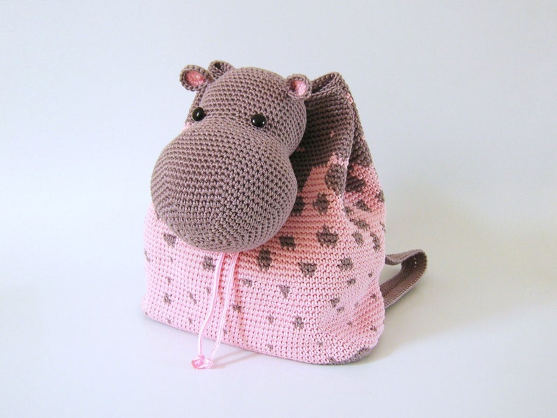 Crochet pattern for hippo backpack. Cute and practical accessory for kids. Charts with symbols, written instructions, photo tutorial. image 1