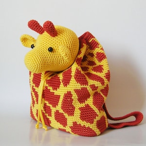 Crochet pattern for giraffe backpack. Cute and practical accessory for kids. Charts with symbols, written instructions, photo tutorial.