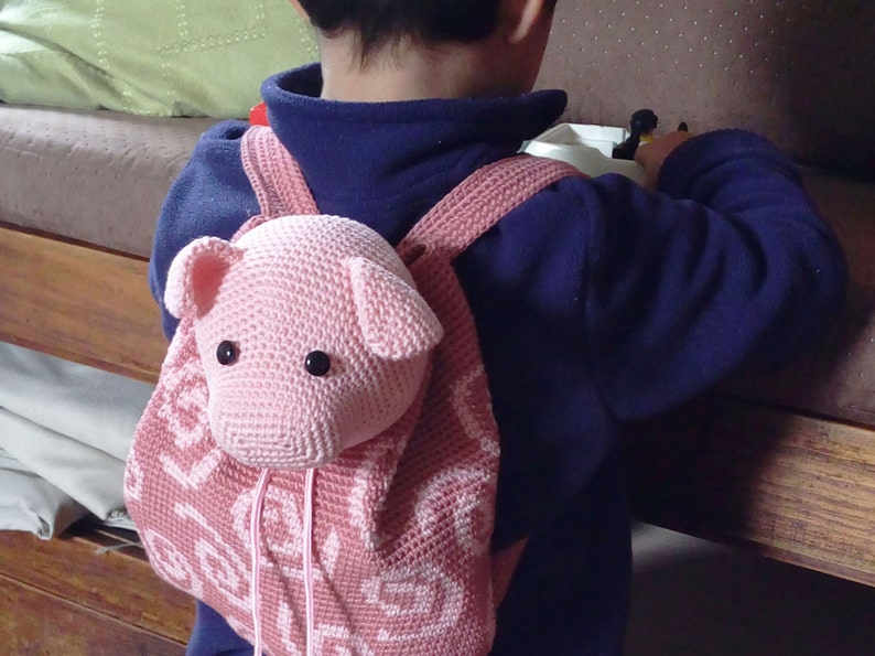 Crochet pattern for pig backpack. Cute and practical accessory for kids. Charts with symbols, written instructions, photo tutorial. image 4