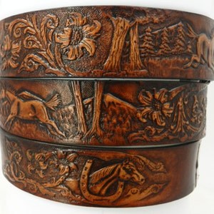 Name Belt.  NBT111 Horse scene - Belt is 1 1/2" wide - Includes name in center back, removable utility buckle & leather keeper