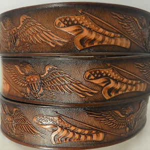 Name Belt NBT528  Patriotic Eagle and American Flag;  1 1/2&quot; wide.  Includes name in center back, removable utility buckle, leather keeper