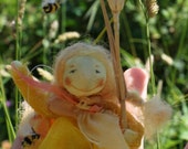 A Sunshine fairy dancer, this summer sprite with tiny bees will join your children's imaginative playtime and grace your nature table