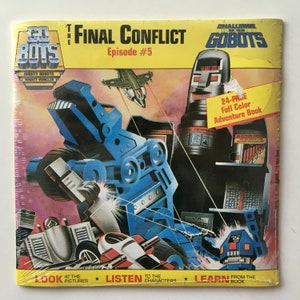 May include: A blue and red GoBots action figure book cover with the title "The Final Conflict" and the episode number "#5". The cover features a blue robot with a red robot in the foreground. The book is a 24-page full-colour adventure book.