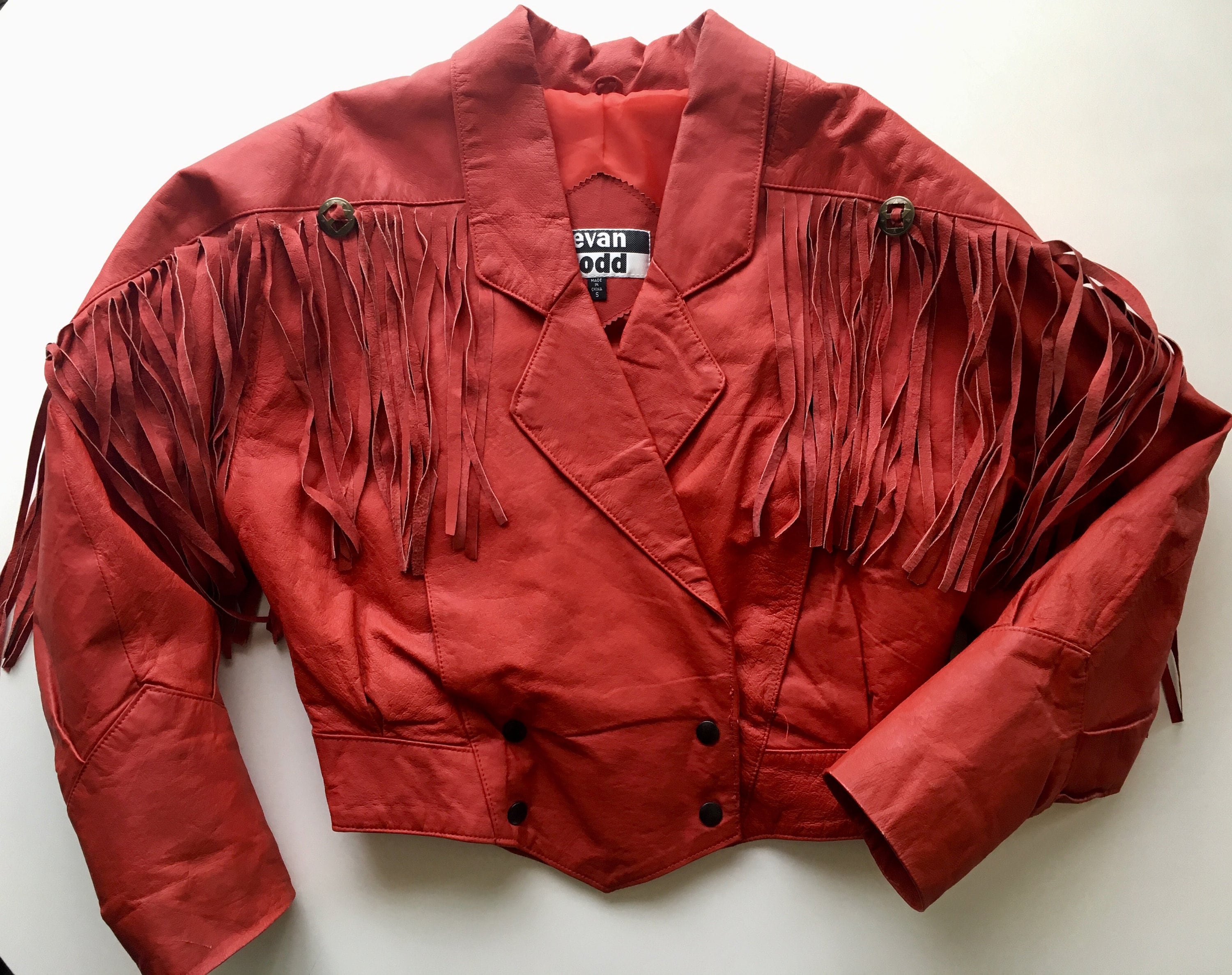 Red fringe coat best sale