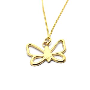 May include: A gold chain necklace with a delicate butterfly pendant. The butterfly is a simple outline design.