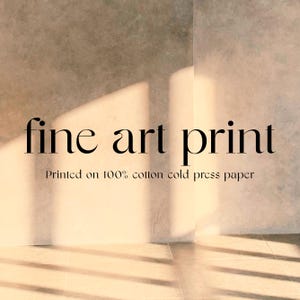 a white wall with the words fine art print printed on it