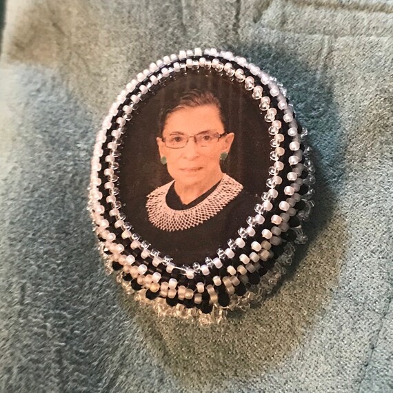 Rbg brooch discount