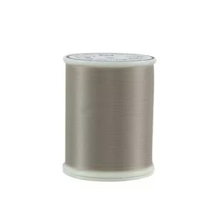 May include: A spool of light gray thread. The thread is tightly wound around a white plastic spool. The spool has a white top and bottom, and the thread is a solid, neutral color. The background is plain white.