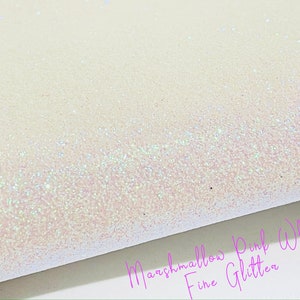 May include: White fine glitter with a subtle iridescent shimmer. The glitter is labeled "Marshmallow Pink White Fine Glitter".