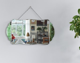 Espejo vintage verde Art Déco con diseño floral y cristal tallado sin marco