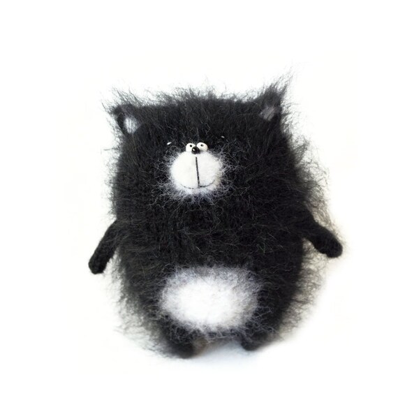 black and white stuffed cat