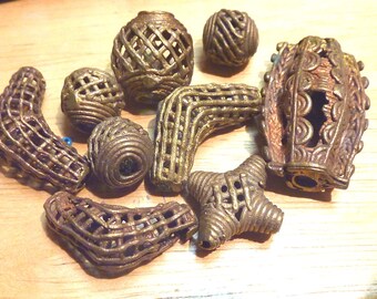 Vintage assortment of lost wax cast African trade beads from Ethiopia, from 14 mm to 36 mm.