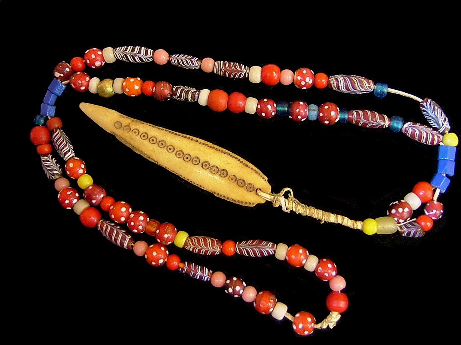 African Necklace With Feather Beads Eye Beads Skunk Beads Etsy