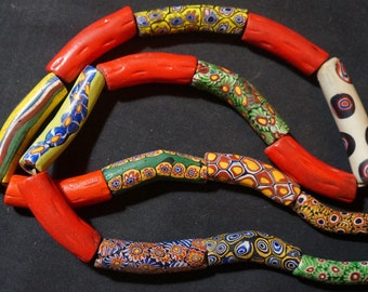 African trade Venetian elbow millefiori mixed strand of long beads. 32 inches, 2 inch beads. Excellent condition (# 316)