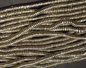 African trade, Vintage Ethiopian nickel silver heishi spacer beads, 14 inches, 1 x 4 mm.