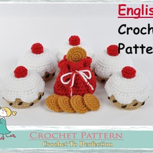 May include: Crochet pattern for a set of five red and white cupcakes and a red drawstring bag with four brown crocheted cookies. The pattern is titled "English Crochet Pattern" and "Crochet To Perfection".